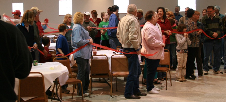 Attendees at the book dedication and ribbon cutting ceremony for Mel Oliva’s first book; The 10 Days of Thanksgiving …a comedy of errors.  